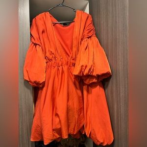 Plunging V neck dress with puff sleeves